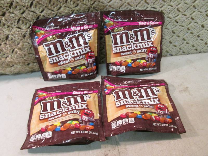 lot 57 image: 4 Bags of M&Ms Snack Mix Sweet & S...