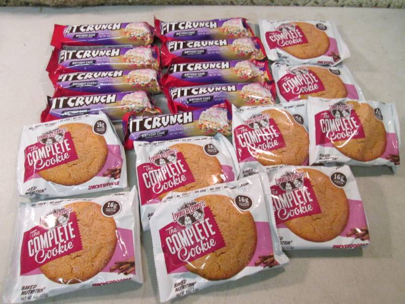lot 75 image: Birthday Cake Protein Bars and Snic...