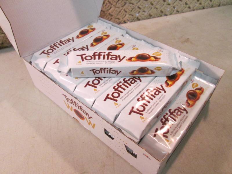 lot 102 image: Box of 21 4-Piece Toffifay Candy Be...