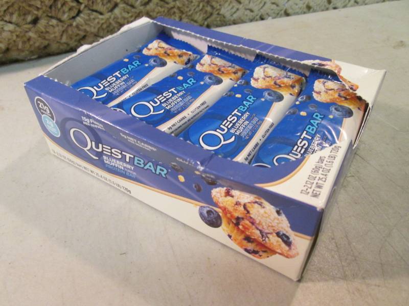 lot 117 image: Box of 12 Quest Bar Blueberry Muffi...