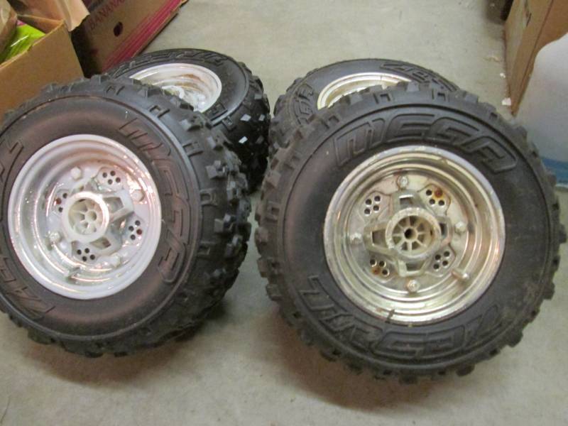 lot 132 image: Set of 4 Plastic Power Wheels Wheel...