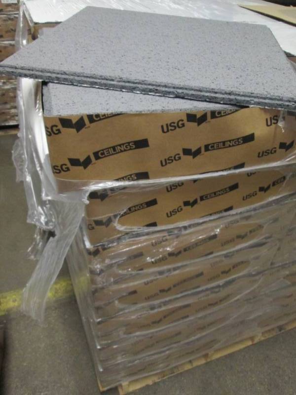 lot 262 image: 7 Cases of USG CGC Acoustical ceiling panels, 8 tiles per case 2 x 2 foot, Clima Plus Warranty, Anti sag, Beveled Edge.  Frost (Gray) color.  Brand new