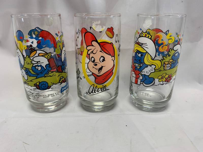 lot 46 image: Lot of 3 Smurf, Alvin Chipmunk Glasses from 1983 1985
