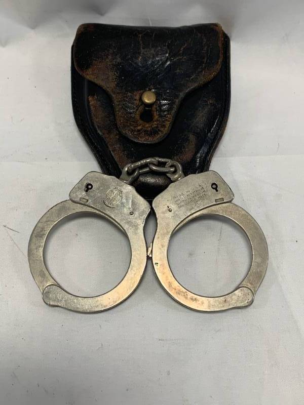 lot 51 image: Vintage Smith & Wesson Handcuffs & Leather Case