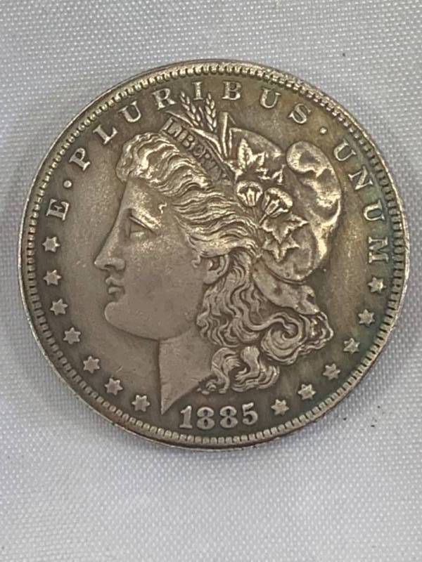 lot 121 image: 1885 Morgan Dollar Zombie Coin