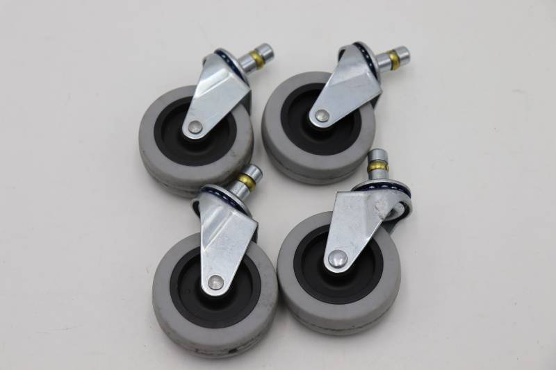 lot 29 image: Lot of 4 2-12 Rubber Casters