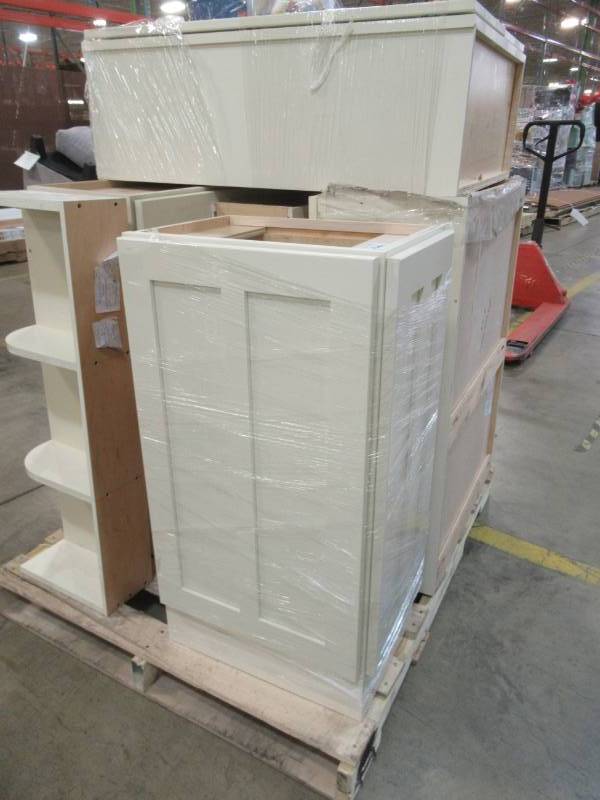 lot 25 image: Pallet of Elkay Wood Products Custom Cream Kitchen Cabinets.