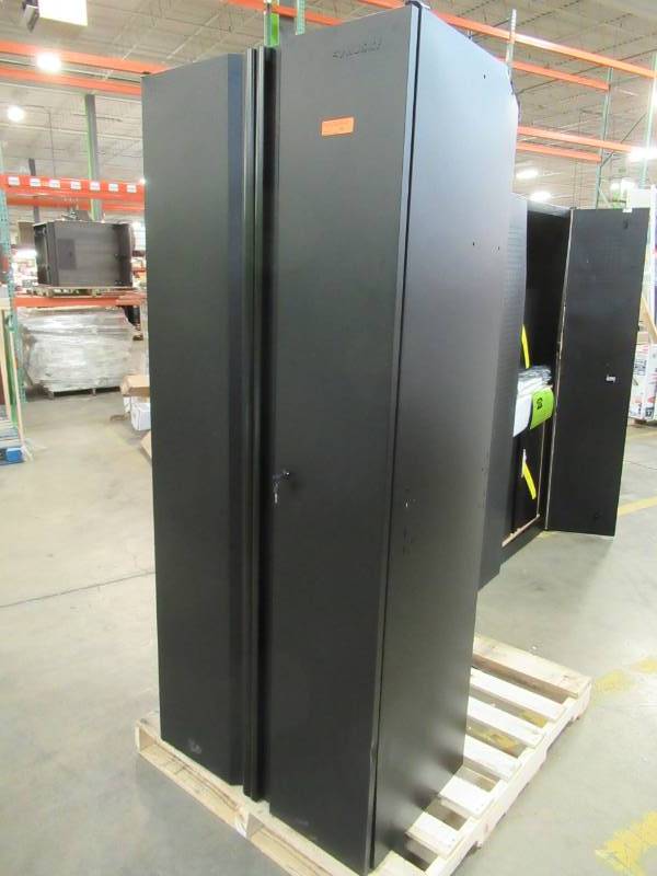lot 192 image: Husky Welded 54 in. W x 75 in. H x 19 in. D Steel Garage Cabinet Set in Black (3-Piece) - Minor Dents on Locker in upper Back RH Corner and Door.