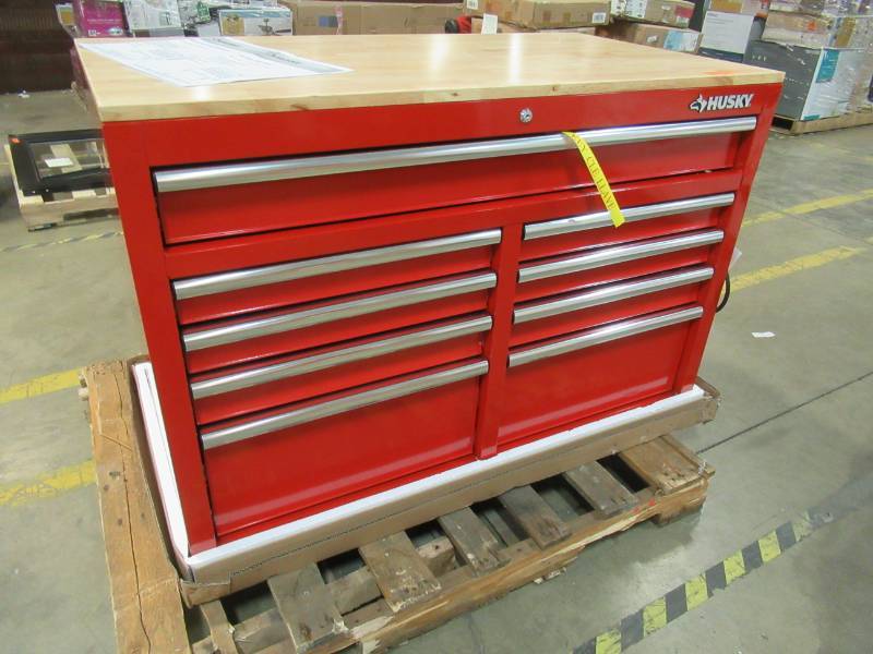 lot 30 image: Husky 46 in. W x 24.5 in. D 9-Drawer Mobile Workbench with Solid Wood Top in Red, H46MWC9RXD