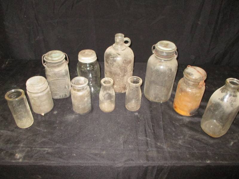 lot 22 image: Old milk Bottles, jars and jugs