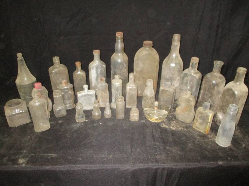 lot 24 image: Old Bottles