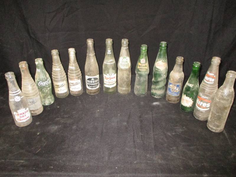 lot 26 image: Old Pop Bottles