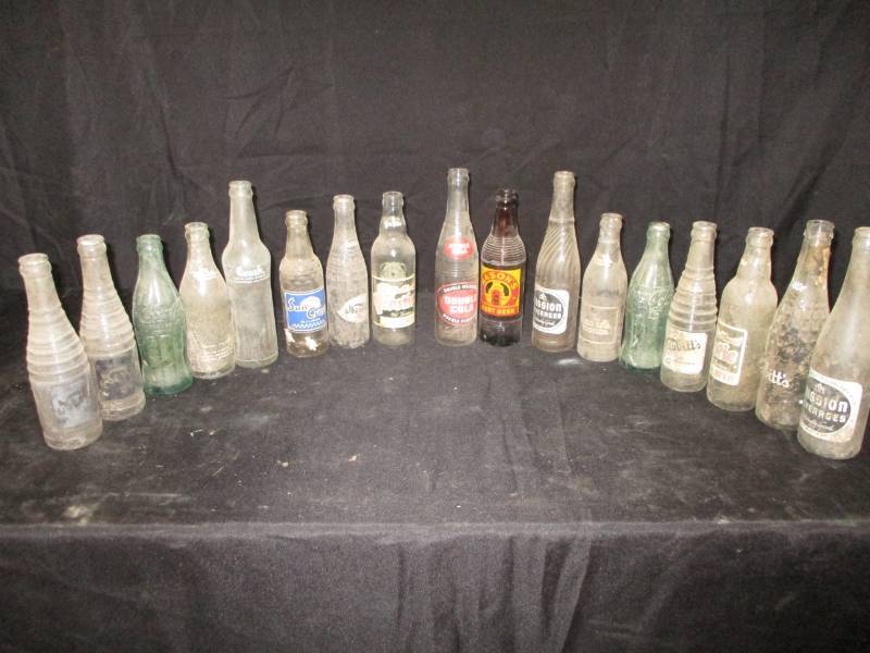 lot 27 image: Old Pop Bottles
