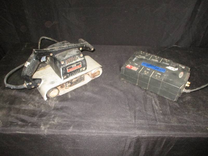 lot 36 image: Sander and Surge Protector