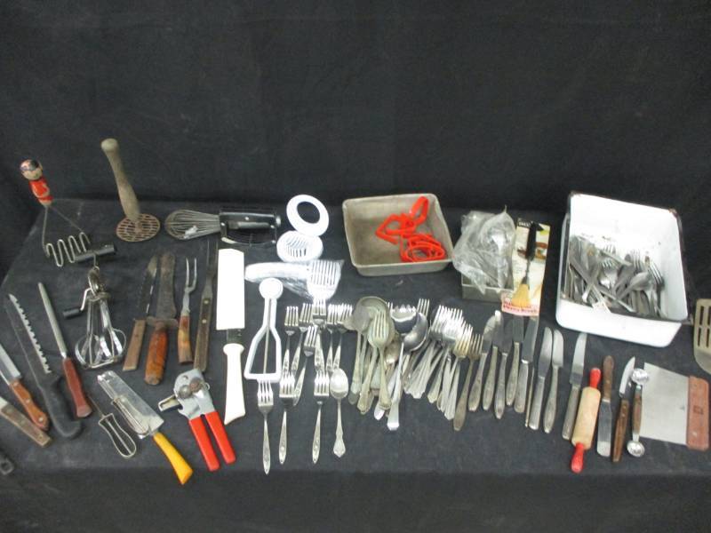 lot 54 image: Lots of Silverware in old enamel fridge drawer