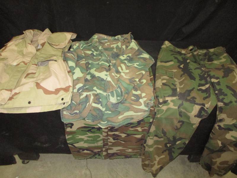 lot 97 image: Camoflauge Military Clothes size 34-36 and 36 pants and medioum shirts
