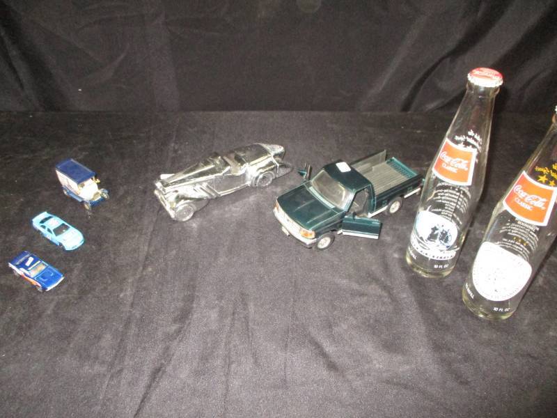lot 110 image: Pickup, Coke bottles, Avon Car and some hotwheels