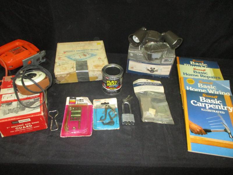 lot 113 image: Self help books, Jig Saw 2 quart of valvoline oil paper and flex seal