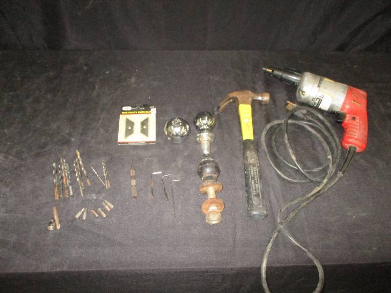 lot 114 image: Milwaukee drill 14 Drive, Hammer and Truck Balls