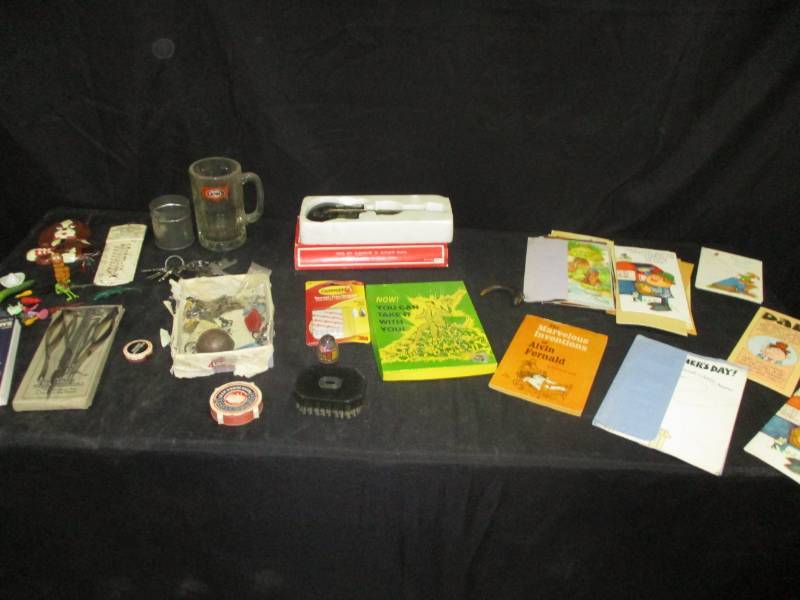 lot 119 image: A&W Mug, old brush, Cards, rugg shuttle needle, toys old keys, and misc