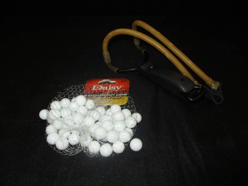 lot 138 image: Slingshot with Glass Slingshot Ammo Marbles