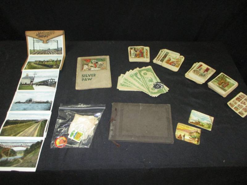lot 144 image: Old Play Money, Pictures, Book, Scrapbook, collector cracker jack toys and more