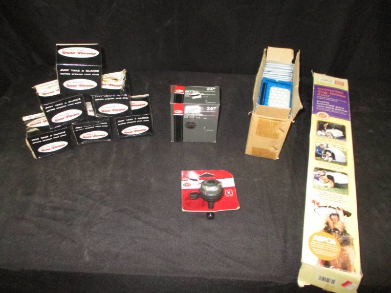 lot 182 image: Self Seal Bike Tubes, push pins, Universal doggie door, viewers