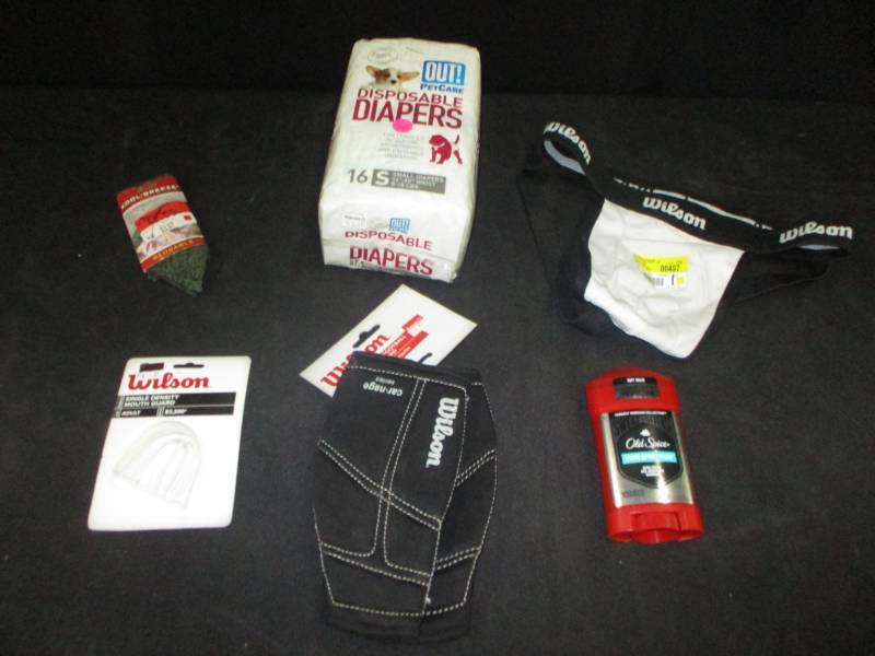lot 184 image: Deoderant, football forearm pads, Jock Straps, mouth guard, Kool Breeze
