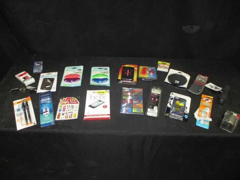 lot 185 image: Hotwheels stickers, phone covers, magnifying mirror, book light, toothpaste squueze, phone shatter screens iphone 5 5s, 5c, soniccare toothbrush heads and more
