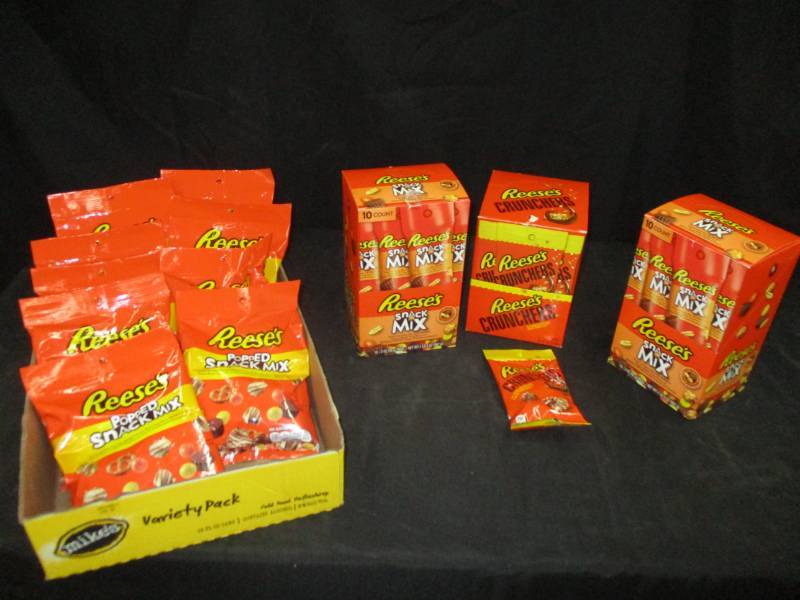 lot 199 image: 3 boxes of reeses crunch snack mixes and 10 big bags of snacks