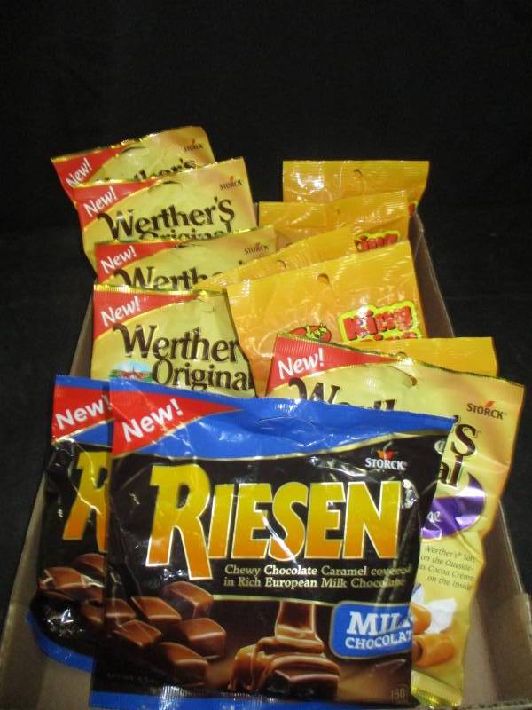 lot 208 image: 12 bags of werthers and reisen snacks