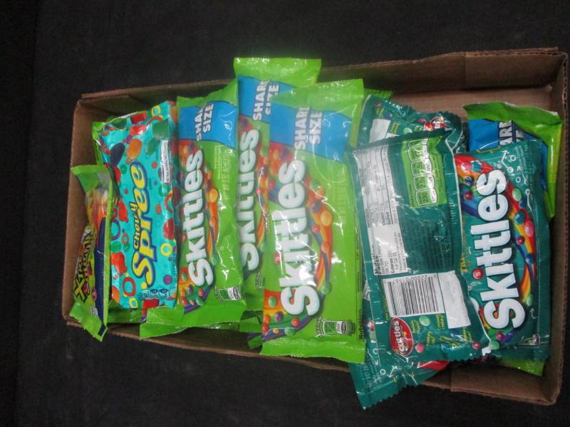 lot 233 image: 31 bags of skittles