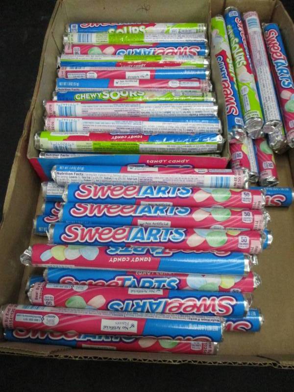 lot 244 image: 57 rolls of sweet tarts