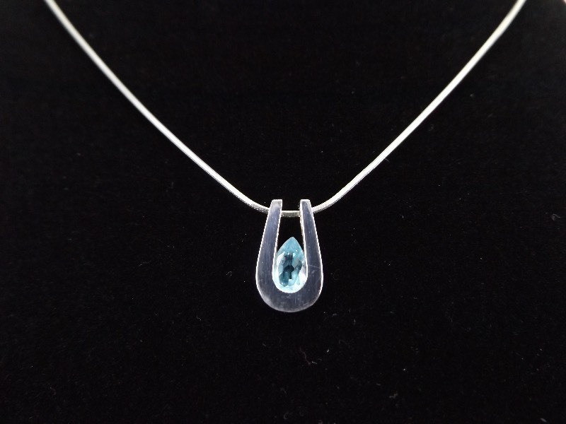 .925 Sterling Silver Pear Cut Blue Topaz Horseshoe Pendant Necklace