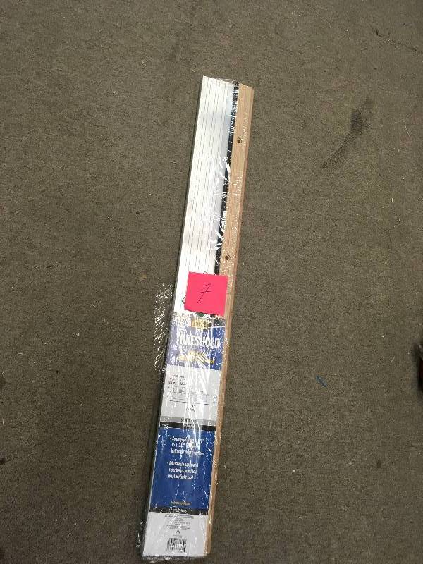 M-D Building Products 4-916 in. x 36 in. Satin Aluminum and Oak Adjustable Threshold in very good condition