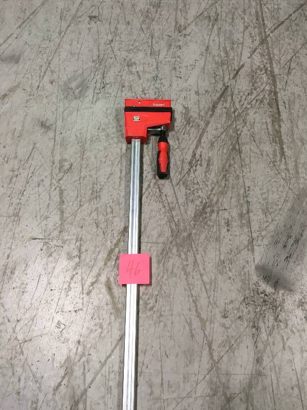 BESSEY 50 in. K-Body REVOlution (KRE) Parallel Clamp with Composite Plastic Handle and 3-34 in. Throat Depth in very good condition