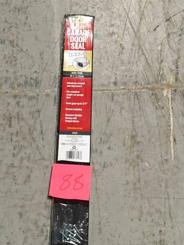 M-D Building Products 1-58 in. x 9 ft. Aluminum and Vinyl Garage Door Bottom in very good condition