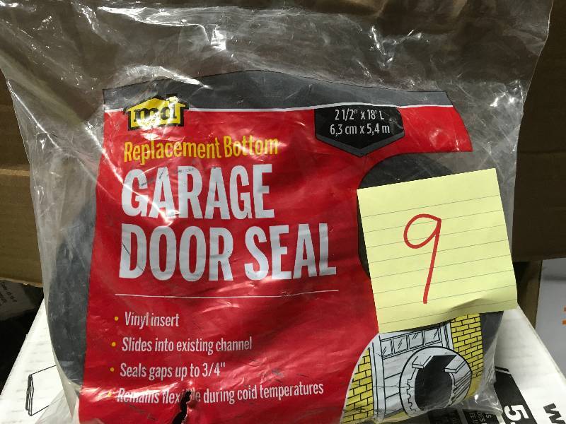 lot 9 image: M-D 18-ft x 2-58-in Black Vinyl Garage Weatherstrip not used