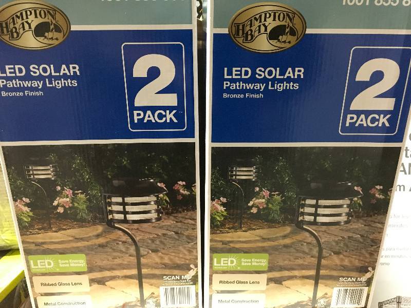 lot 12 image: Hampton Bay Solar Bronze Outdoor Integrated LED New Age Pagoda Landscape Path Light (2-Pack) QTY 2 not used