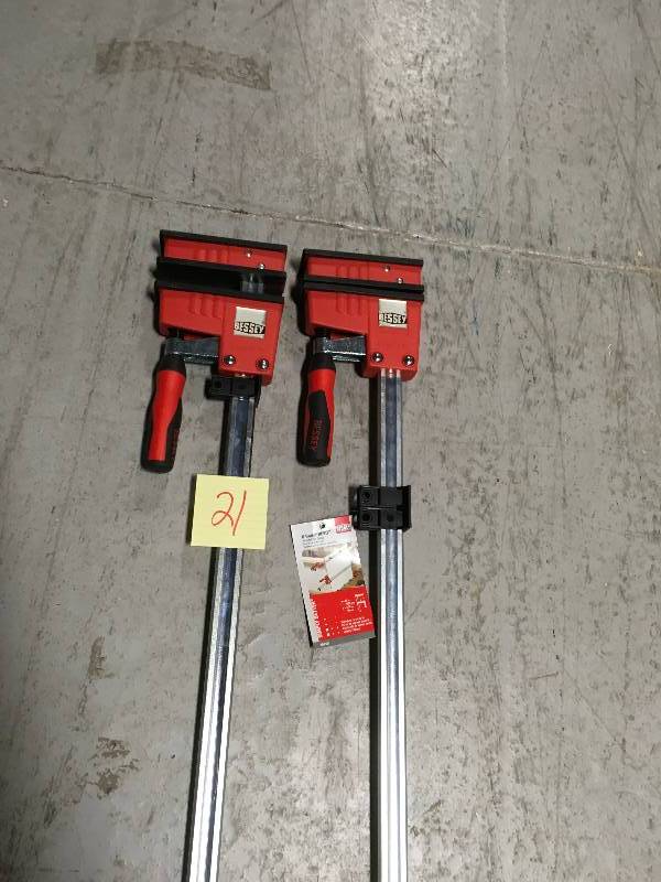 lot 21 image: BESSEY 50 in. K-Body REVO Parallel Clamp with Composite Plastic Handle and 3-34 in. Throat Depth  in good condition