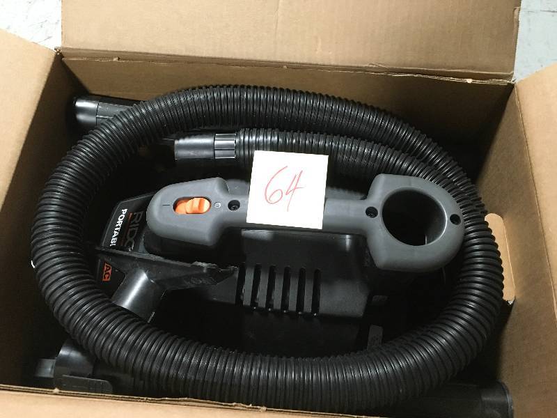 lot 64 image: RIDGID 4 Gal. 5.0-Peak HP Portable WetDry Vacuum in good condition