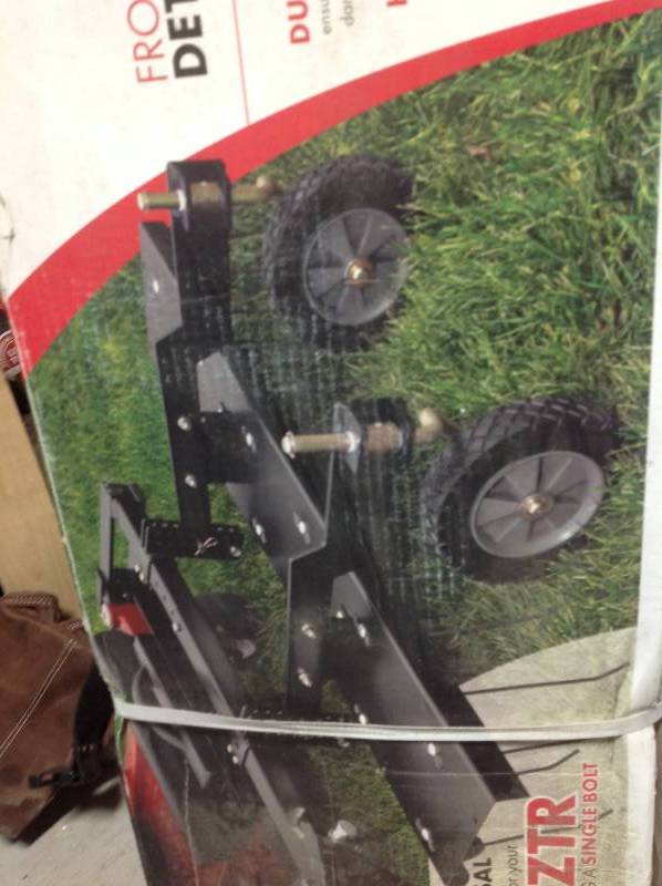 lot 12 image: Brinly-Hardy 48 in. Front Mount Dethatcher for ZTR Mowers not used