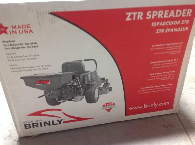 lot 15 image: Brinly-Hardy Rear Mounted ZTR Spreader not used