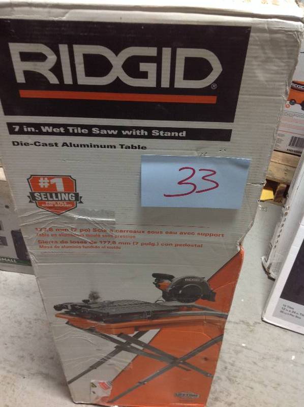 lot 33 image: RIDGID 7 in. Tile Saw with Stand  in good condition
