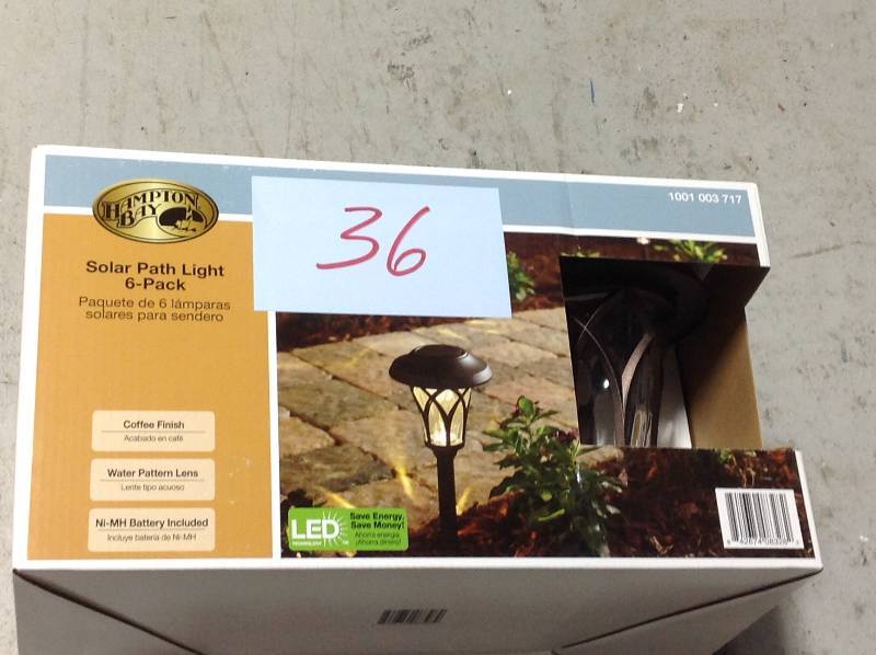 lot 36 image: Hampton Bay Solar Bronze Outdoor Integrated LED Landscape Fan Cage Path Light with Water Glass Lens (6-Pack) not used