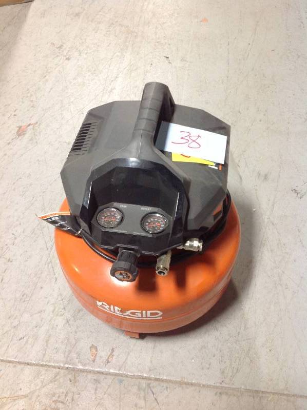 lot 38 image: RIDGID 6 Gal. Portable Electric Pancake Air Compressor in good condition