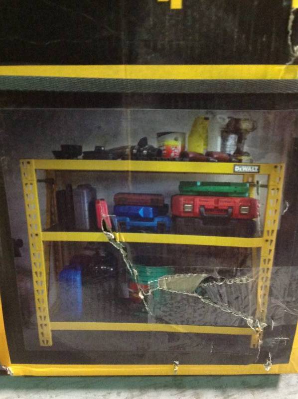 lot 72 image: DeWalt 48 in. H x 50 in. W x 18 in. D Yellow Steel Shelf Rack not used