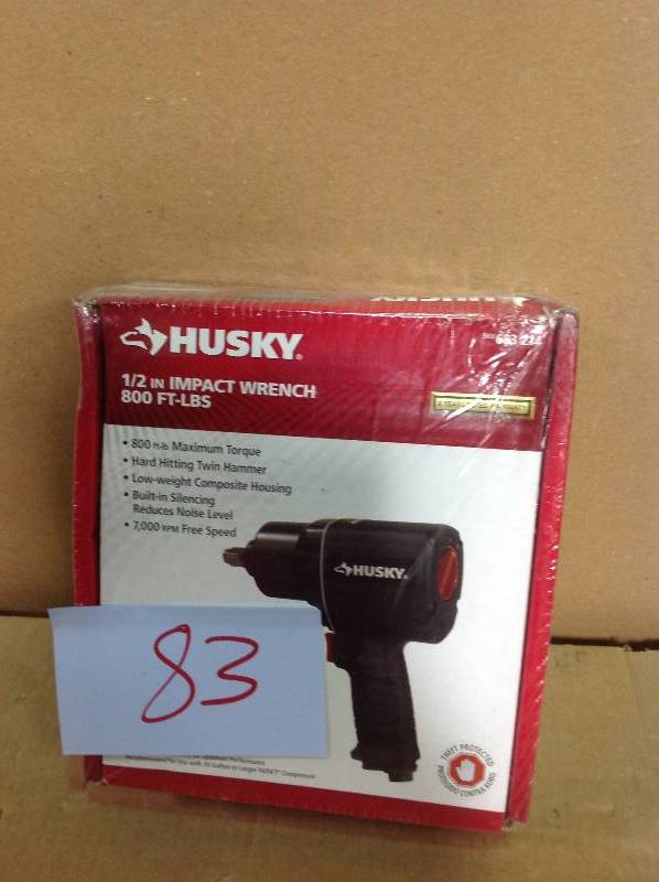 lot 83 image: Husky 12 in. 800 ft. lbs. Impact Wrench in good condition