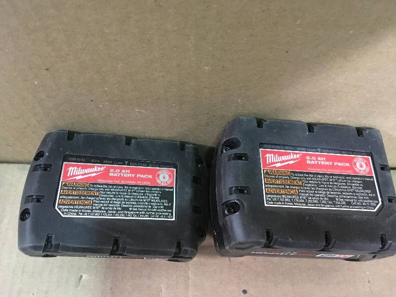 (1) Milwaukee M18 18-Volt Lithium-Ion XC Extended Capacity Battery Pack 5.0Ah (1) Milwaukee M18 18-Volt Lithium-Ion 2.0 Ah Compact Battery  in good condition