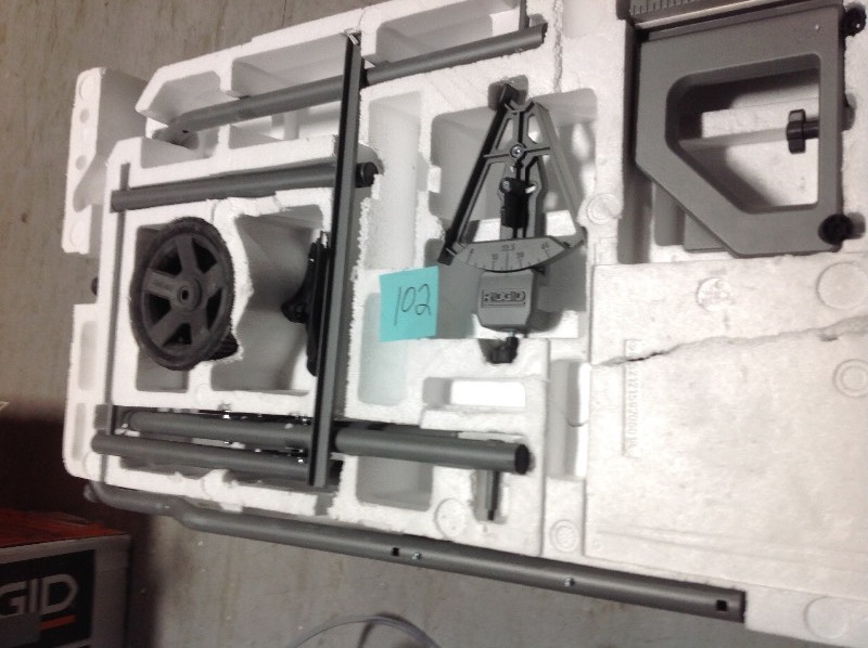 RIDGID 10 in. Wet Tile Saw with Stand NOT USED MISSING PARTS FOR THE STAND, NOT PUM AND NO BLADE IN WORKING CONDITIONS